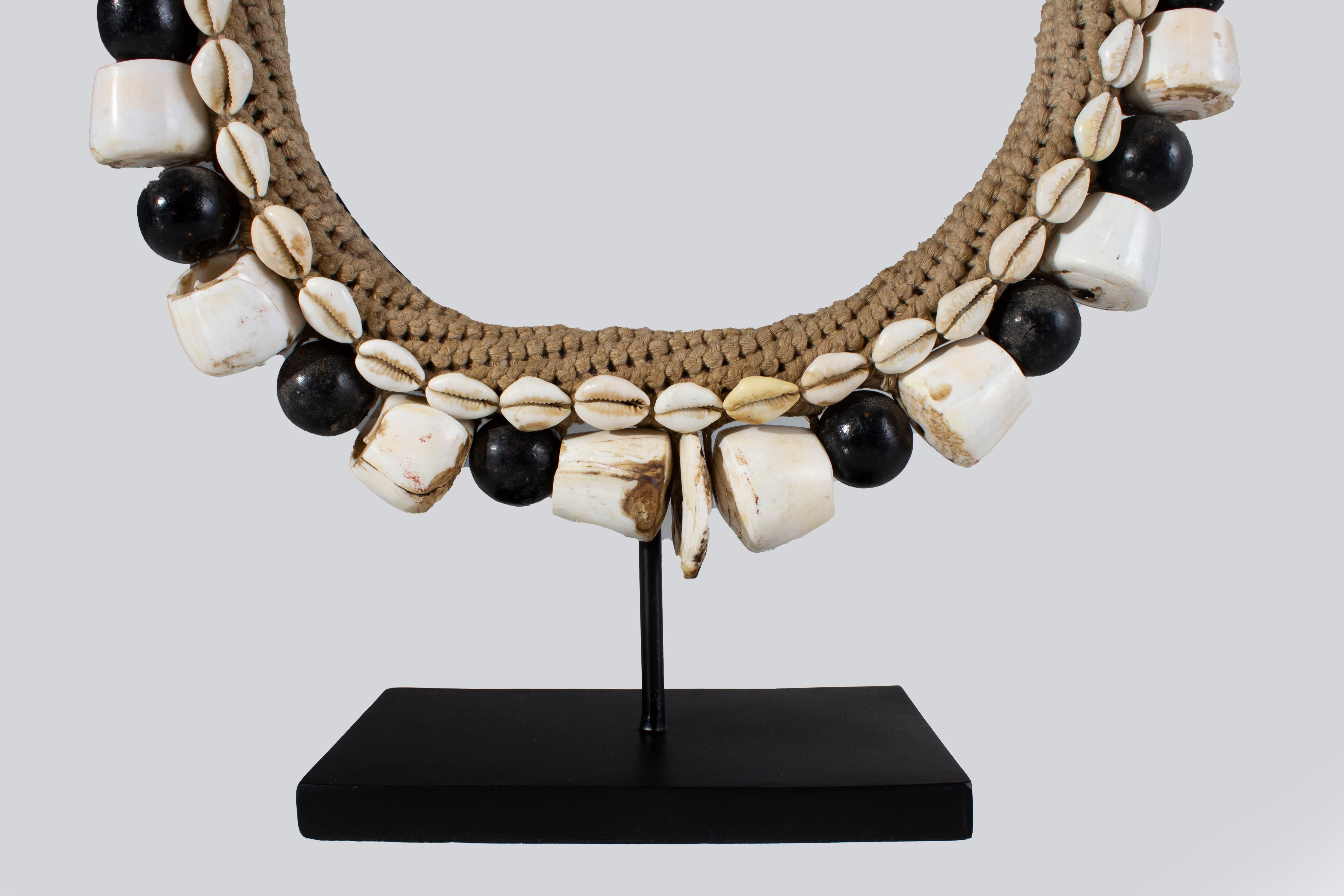 Black Shell Necklace Accessory on Stand