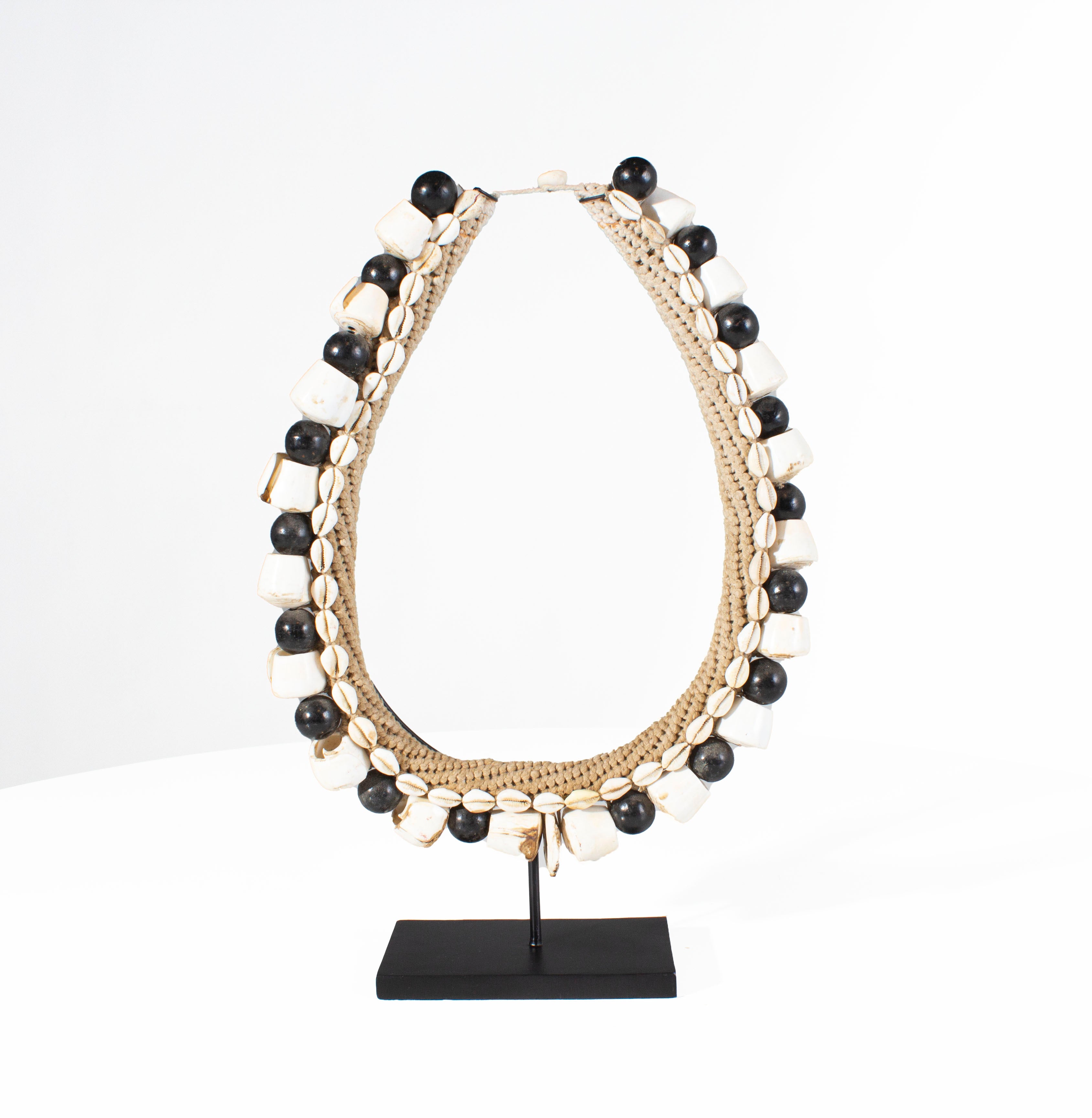 Black Shell Necklace Accessory on Stand