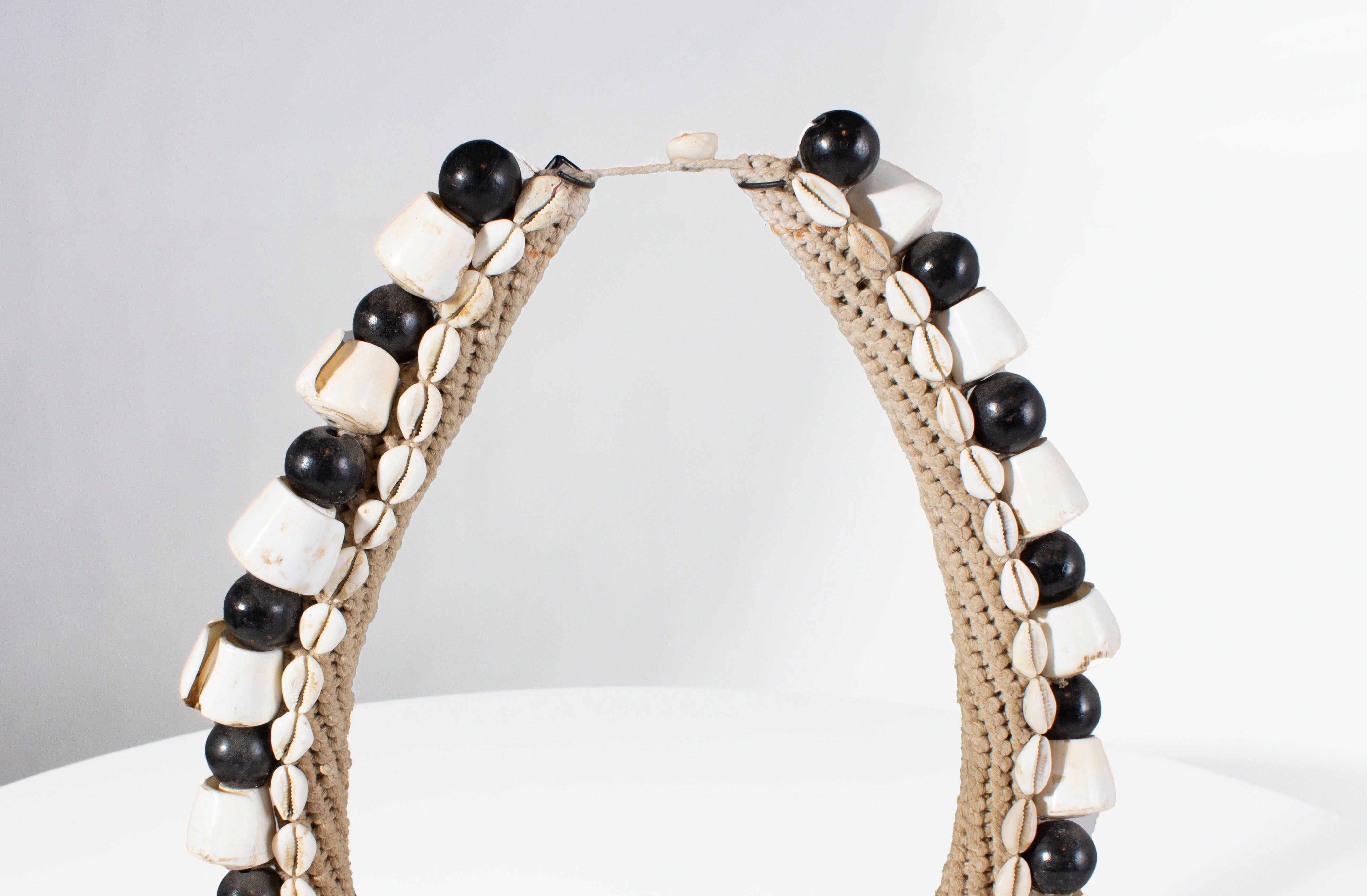 Black Shell Necklace Accessory on Stand